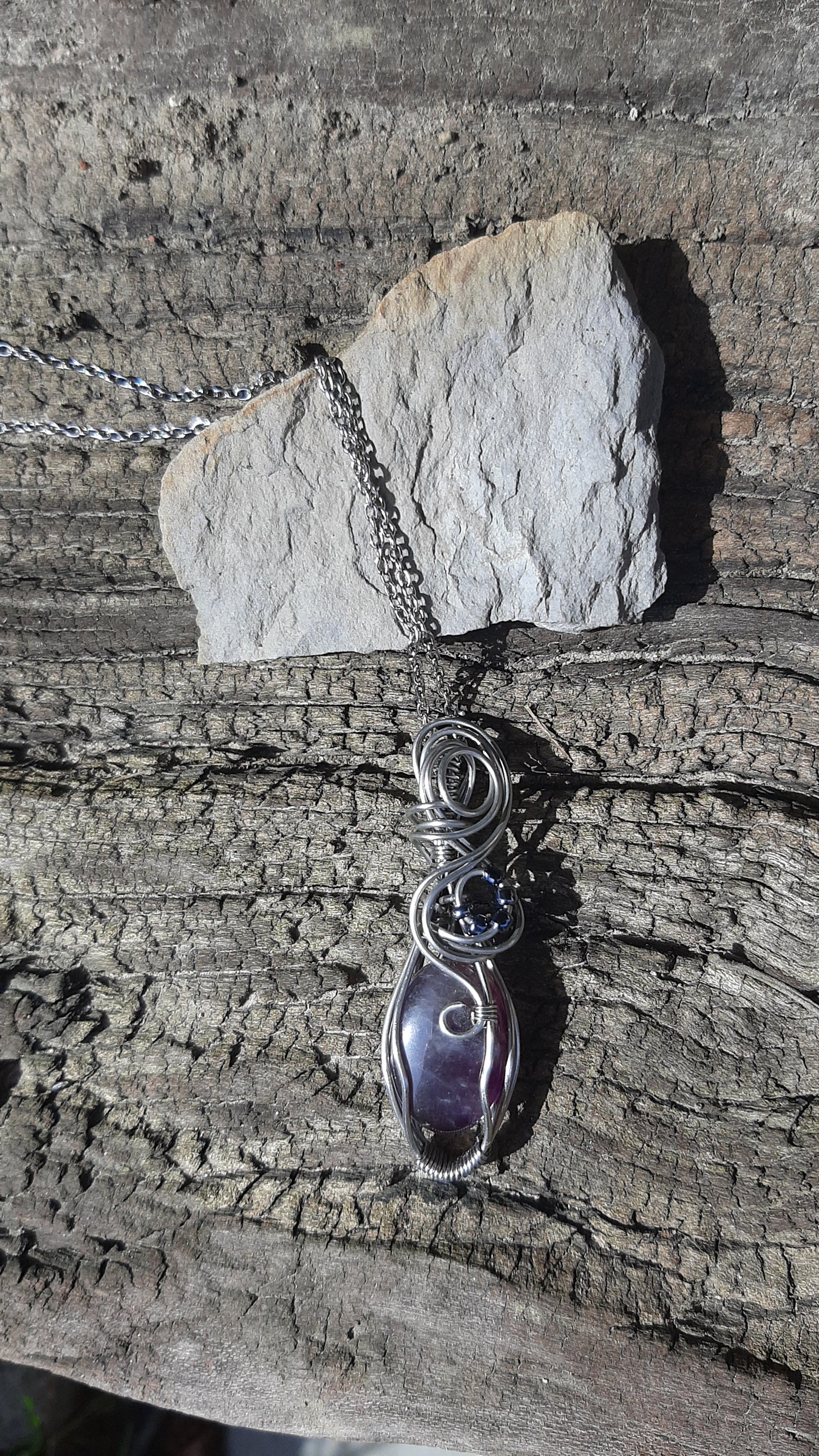 Amethyst wrapped in Stainless steel