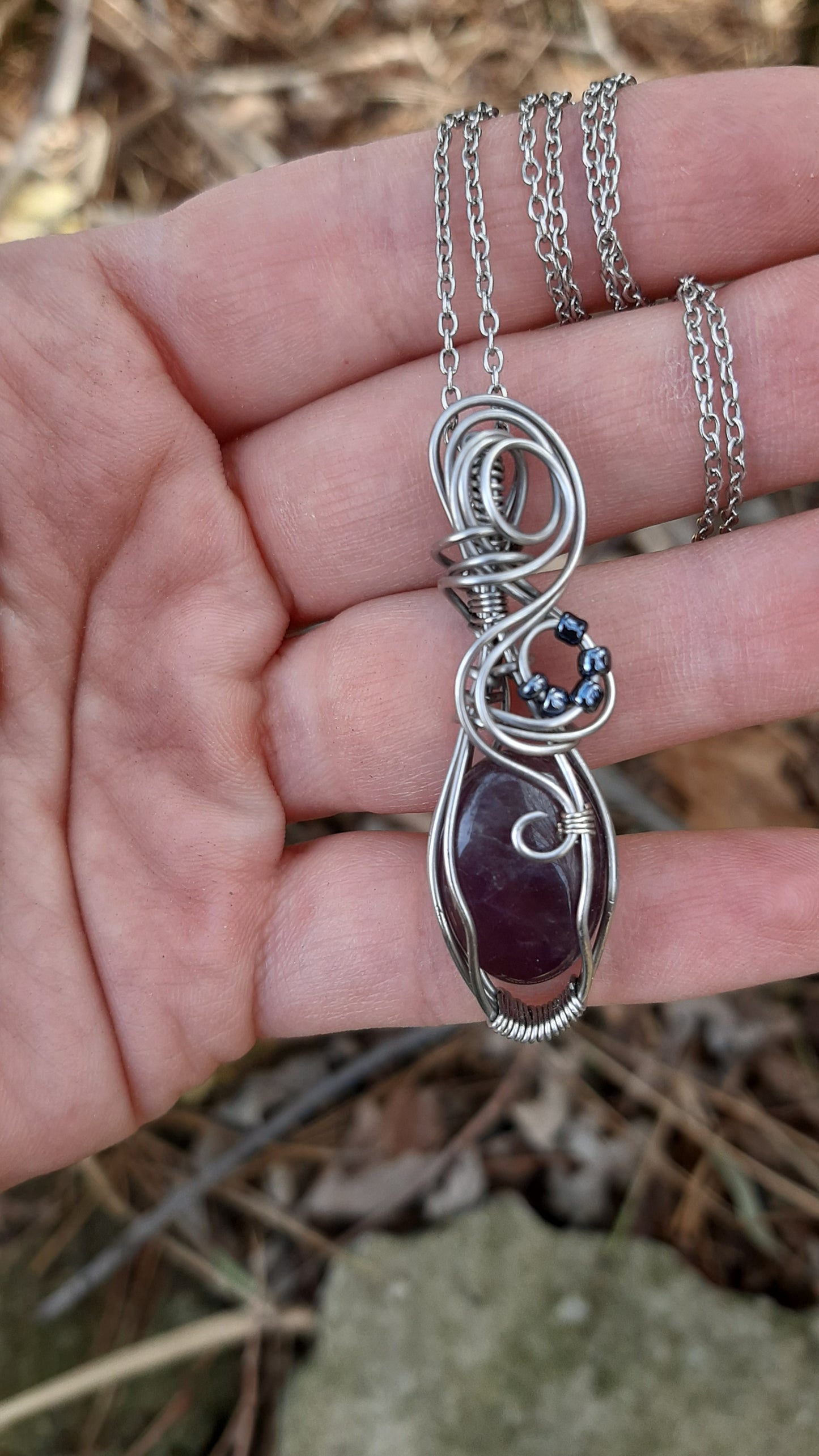 Amethyst wrapped in Stainless steel