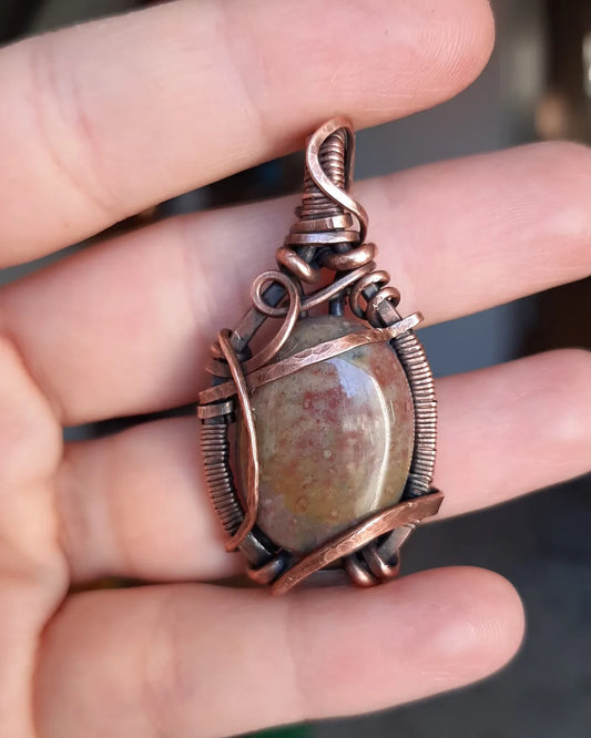 Indian Agate wrapped in oxidized copper