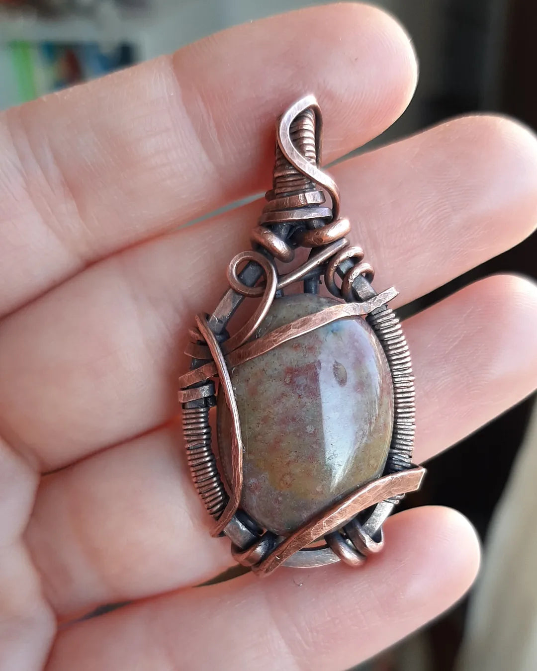 Indian Agate wrapped in oxidized copper