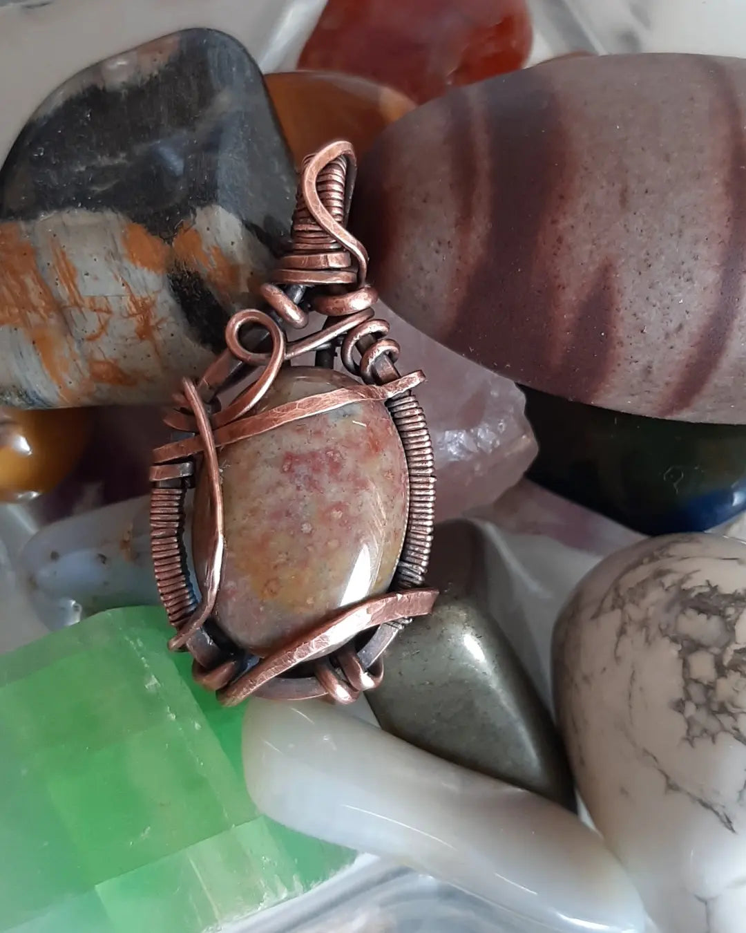 Indian Agate wrapped in oxidized copper