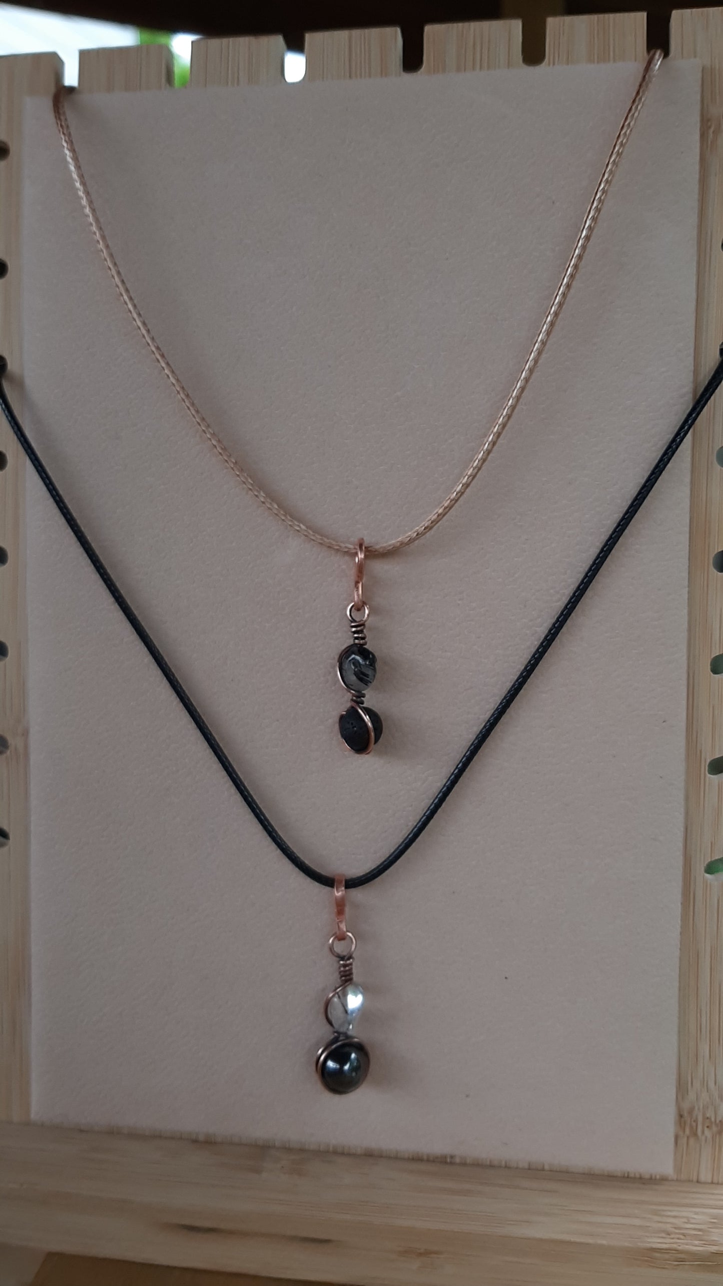 Elegant black rutilated quartz and lava stone wrapped with copper wire