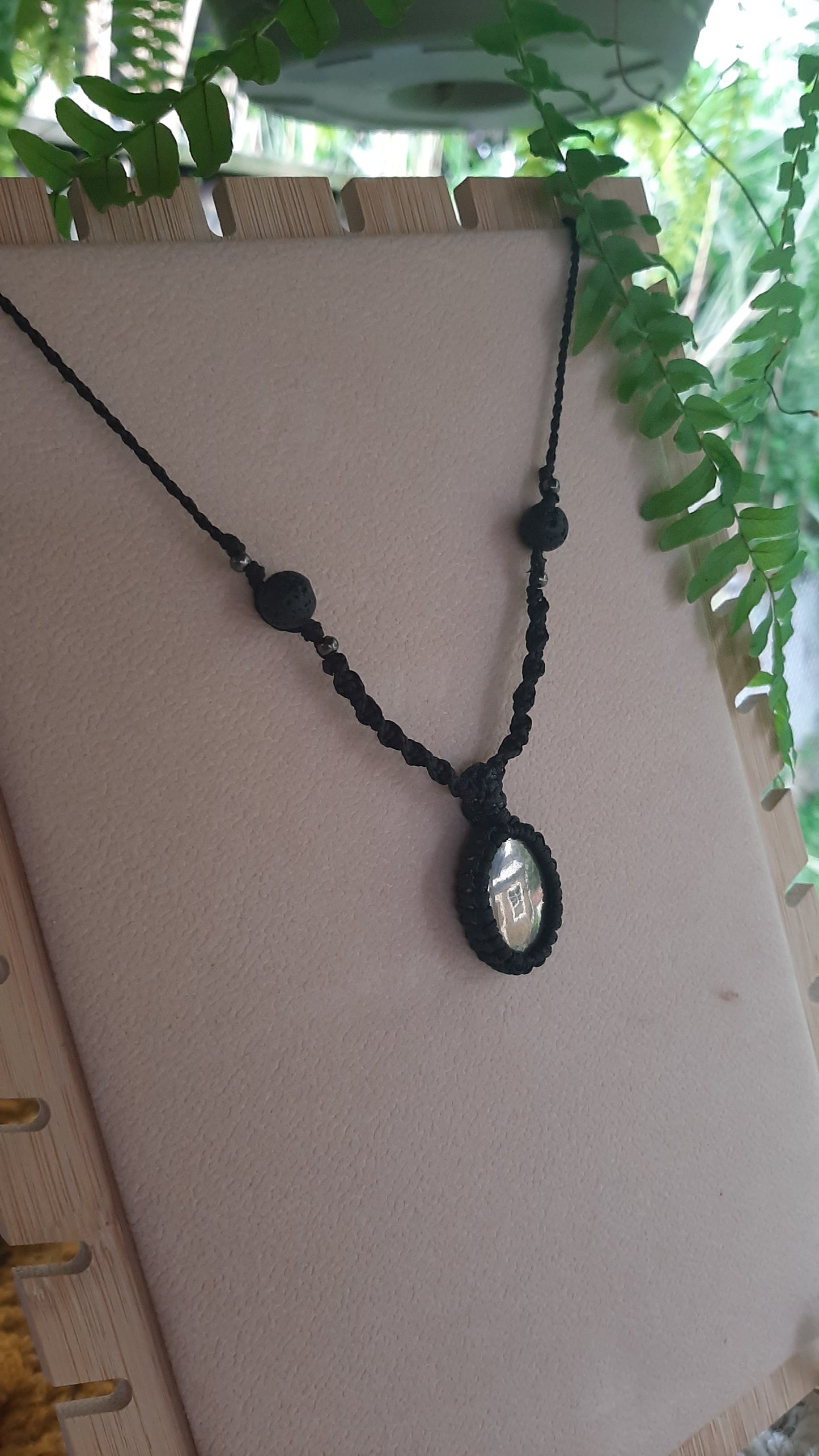 Apache Gold stone and Lava stone pendant - Black Macrame