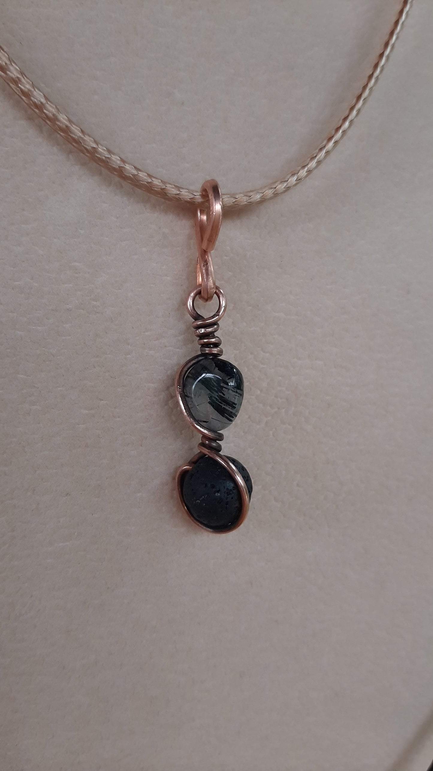 Elegant black rutilated quartz and lava stone wrapped with copper wire